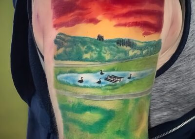 Color realism upper arm tattoo tattooed at Clockwork Tattoo Shop in Centereach, Long Island, New York.